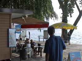 Tao enjoys ice-cold refreshments by the lakeside at Zug Promenade, perhaps the most perfect setting of the tour